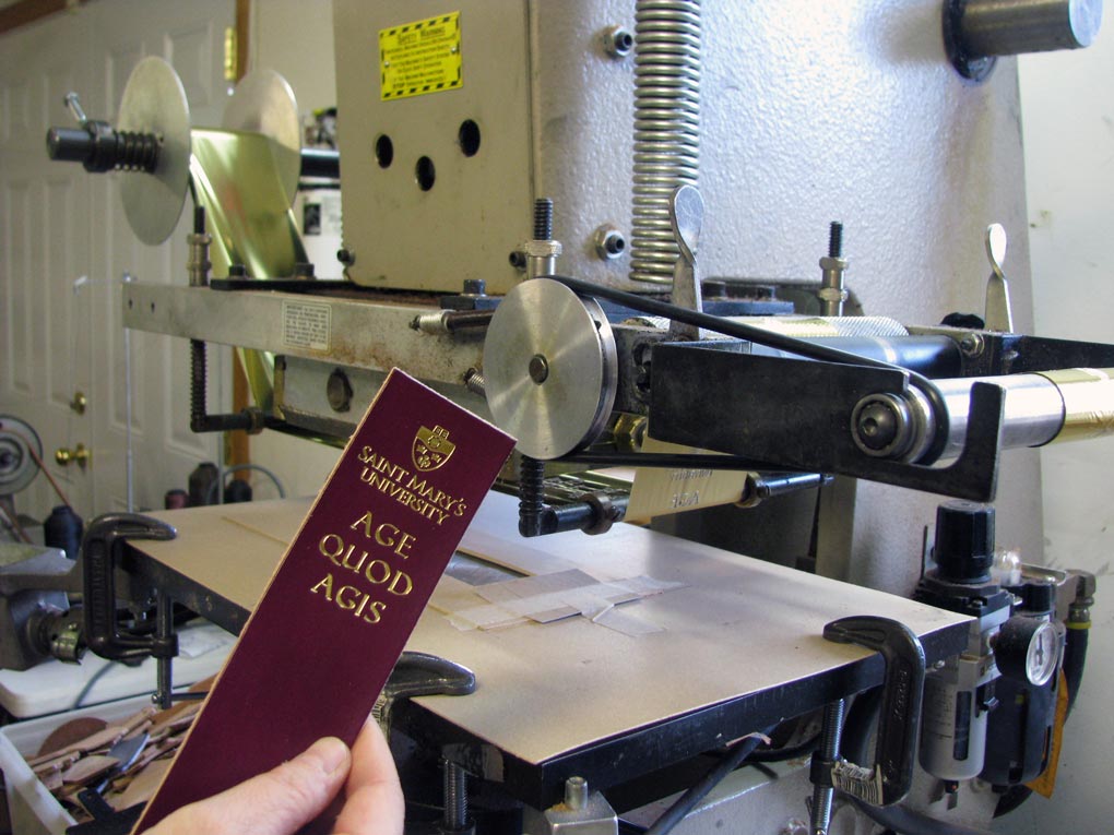 Gold foil imprinting the customer’s logo