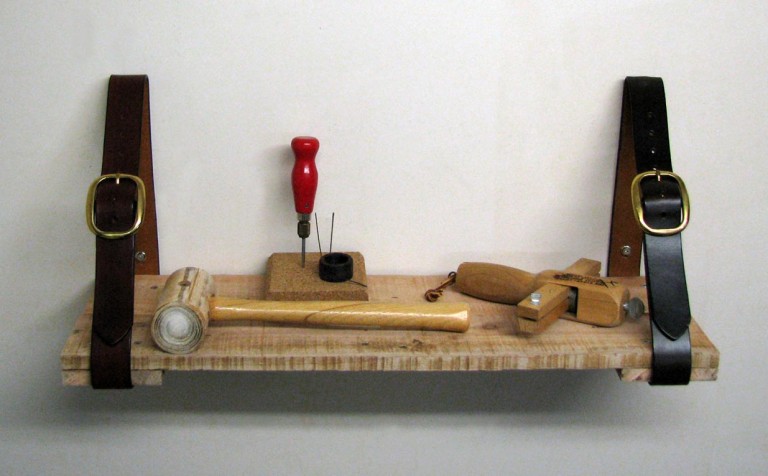 Pallet shelf used in shop for leather hand tools