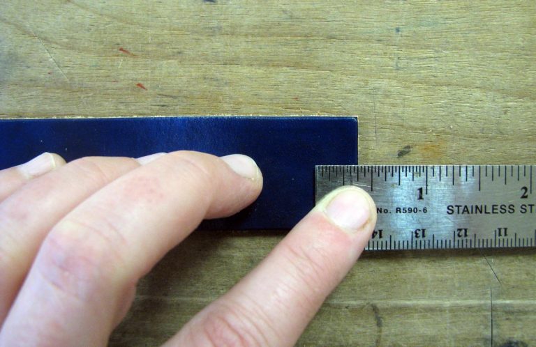 Measure where to place your snaps on your leather strap