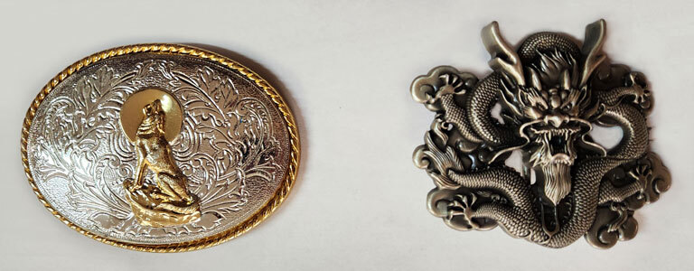 Coyote trophy buckle and dragon novelty buckle. Coyote trophy buckle plate style and dragon novelty buckle.